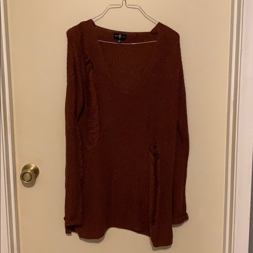 Sweater with holes